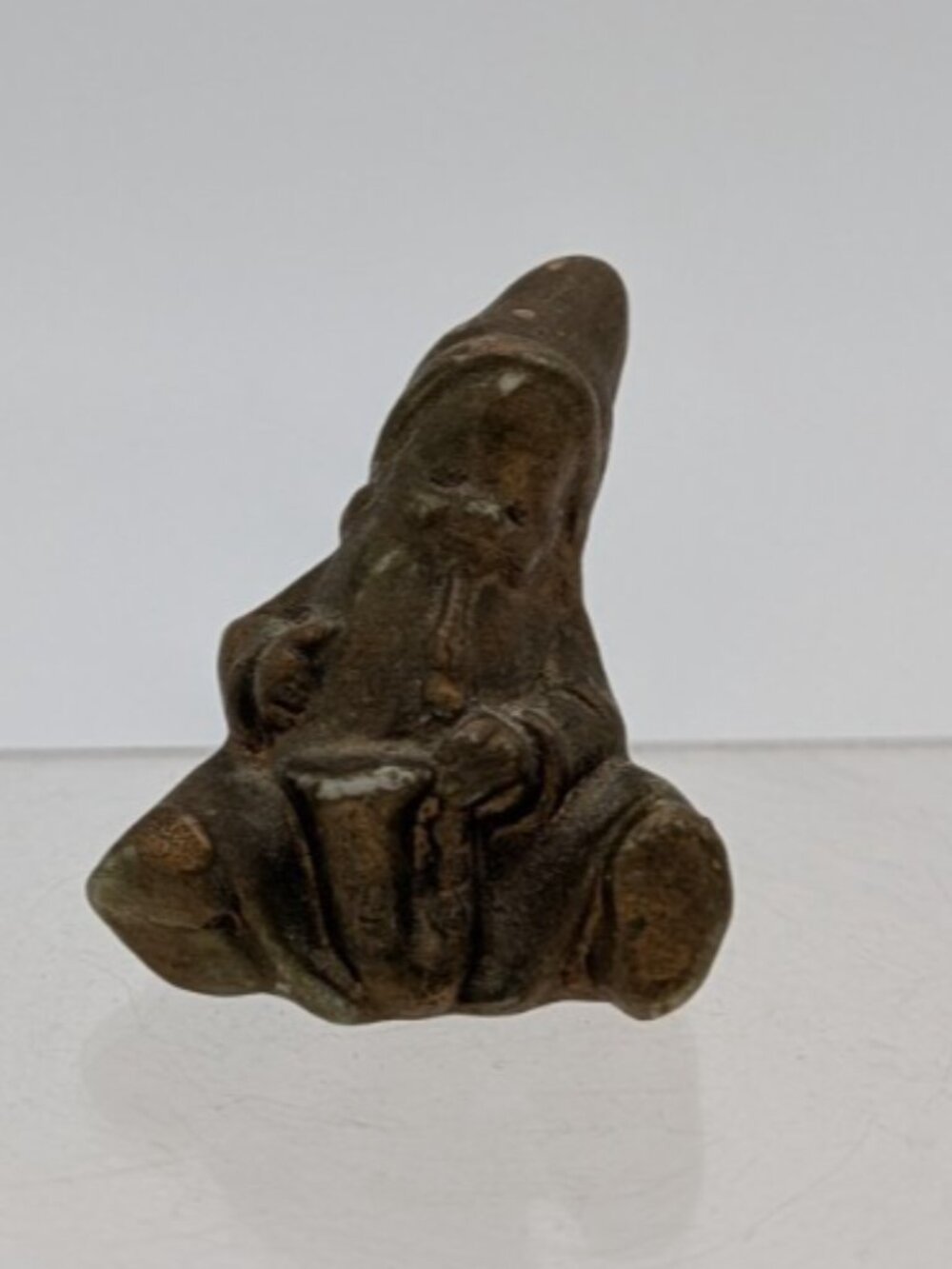 mini ceramic gnome playing saxophone 1.75"
